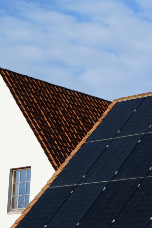 Solar technician on rooftop